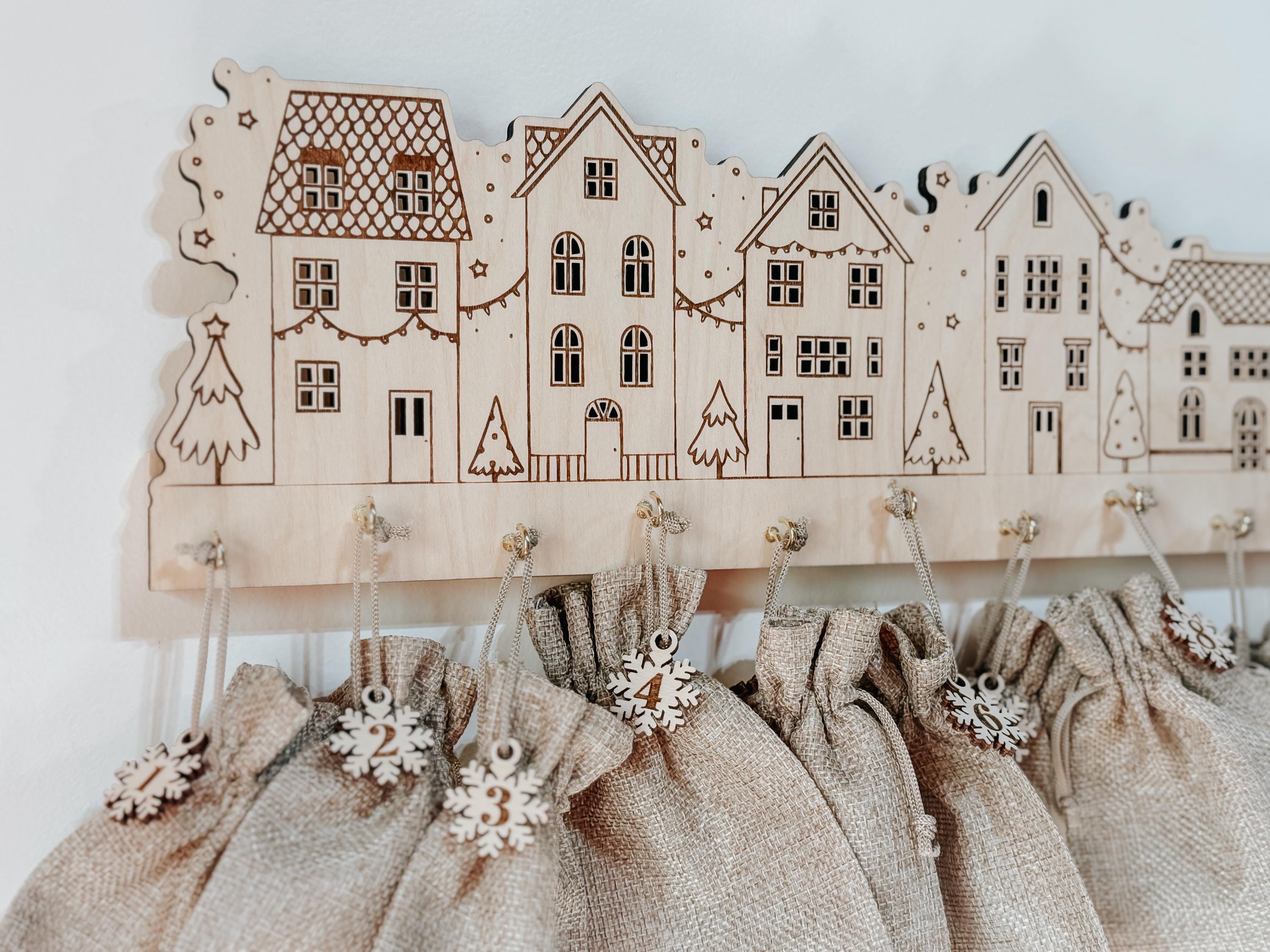 Wooden Advent Calendar Village | 12 Day Countdown with Burlap Bags | Laser Cut Birch Christmas Decor | Hanging Holiday Countdown