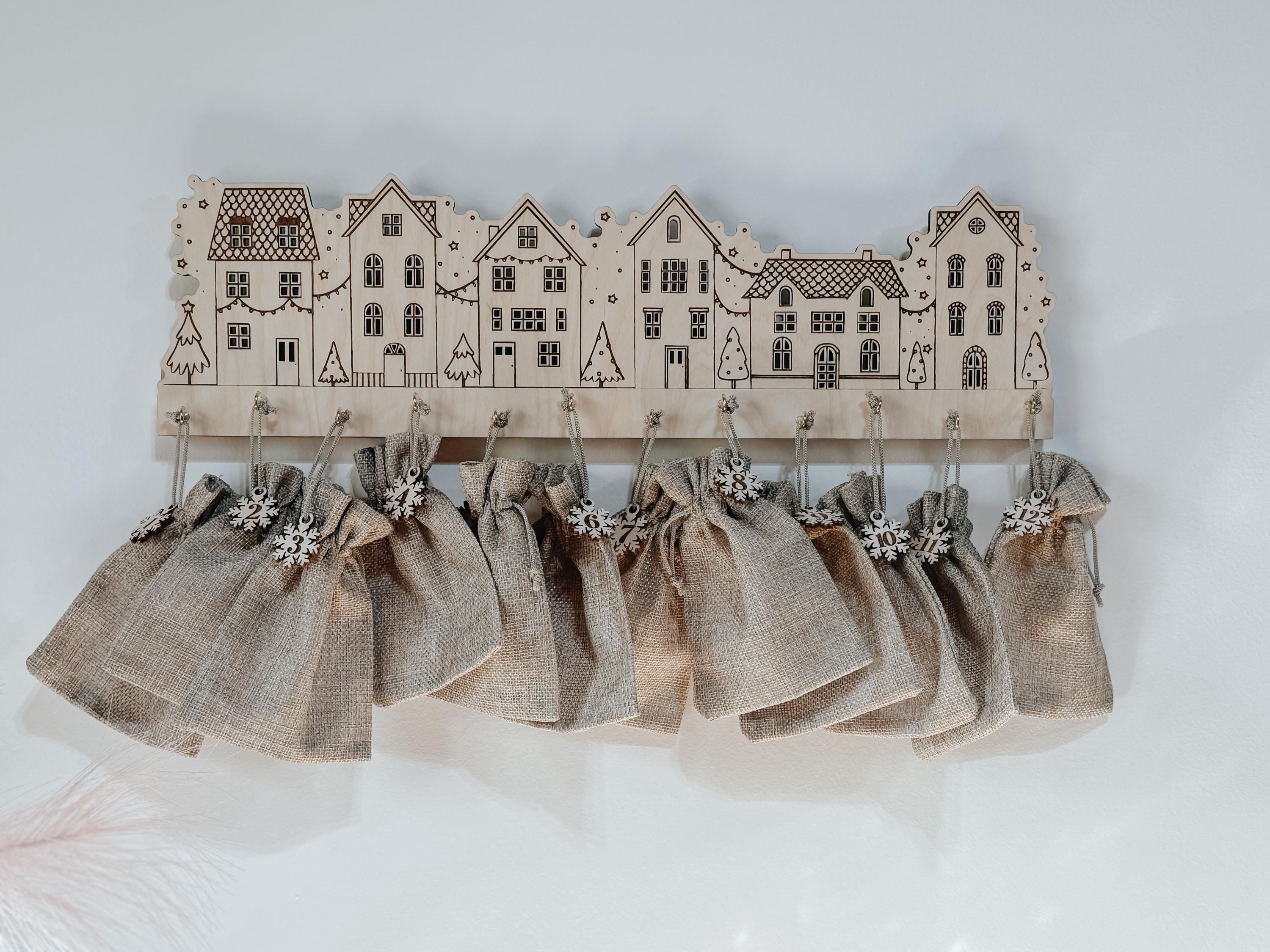 Wooden Advent Calendar Village | 12 Day Countdown with Burlap Bags | Laser Cut Birch Christmas Decor | Hanging Holiday Countdown