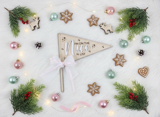 Nice List Christmas pennant with raised white script and a bow, surrounded by gingerbread and ornament accents.