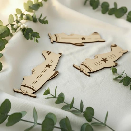 Angled close-up of three wooden airplane wall decorations with propeller and star details.
